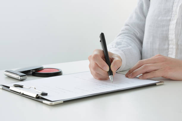 istock Woman making contract in Japan 1133476024
