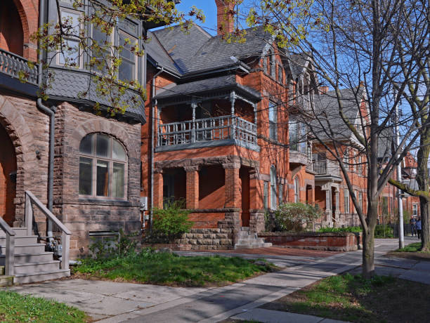 istock street with large old Victorian houses 1133478647