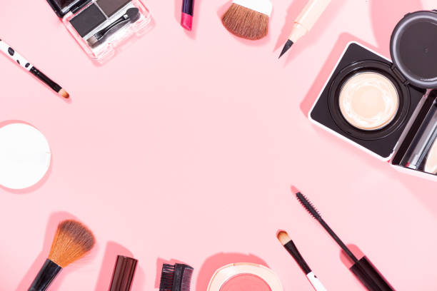 istock Women's Cosmetic Tools and Pink Background 1133481065