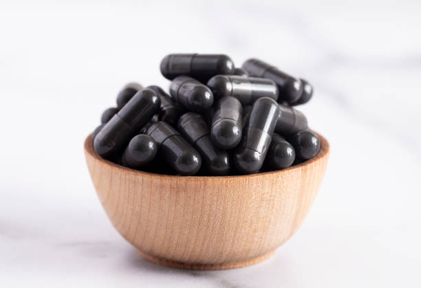 istock A Bowl Full of Activated Charcoal Capsules 1133481962