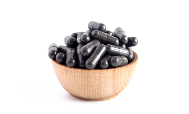 istock A Bowl Full of Activated Charcoal Capsules 1133481964