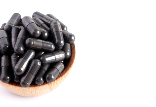 istock A Bowl Full of Activated Charcoal Capsules 1133482056