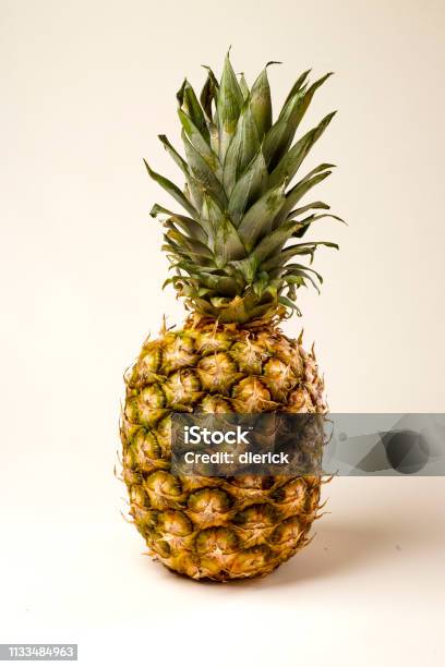 Ripe Pineapple On White Background Stock Photo - Download Image Now - Backgrounds, Citrus Fruit, Close-up