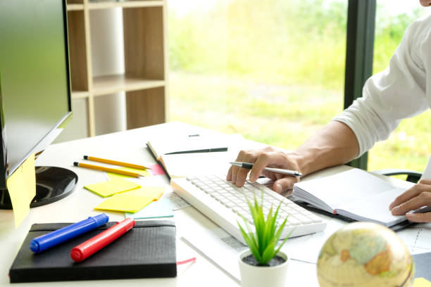 istock woman and man work for education or business on the table 1133486029