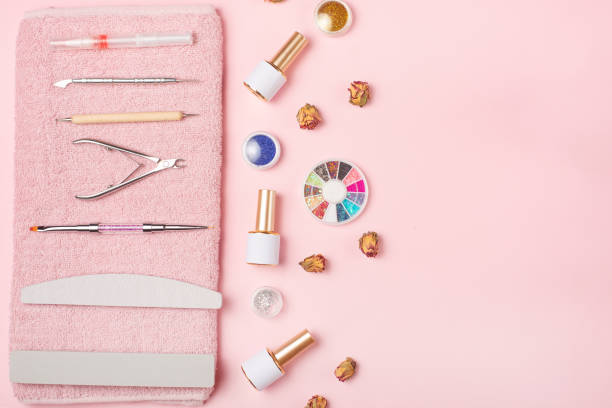 istock Manicure tool on a pink towel and pink background. studio shot 1133486090