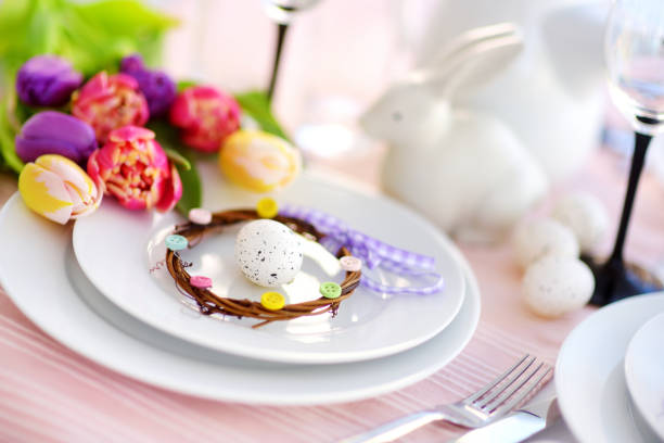 istock Beautiful table setting with crockery and flowers for Easter celebration 1133490502