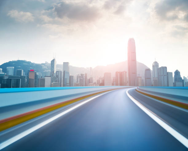 istock Hong Kong skyline and blurred motion road 1133498187
