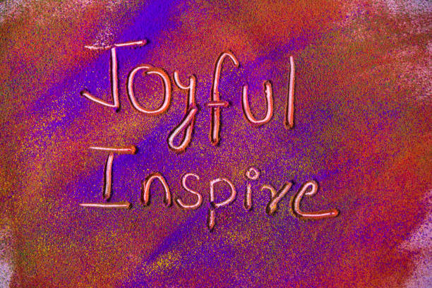 istock Joyful and Inspire word on colorful powder 1133500486