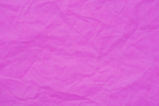 istock pink creased tissue paper texture background 1133505121
