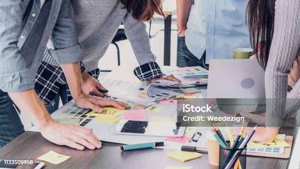 Close Up Creative Designer Applaud For Job Success At Meeting Table At Office Stock Photo - Download Image Now