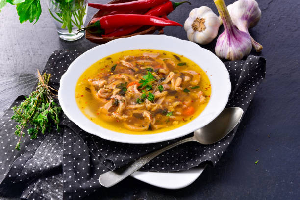 Traditional tripe soup in polish style with beef and vegetables