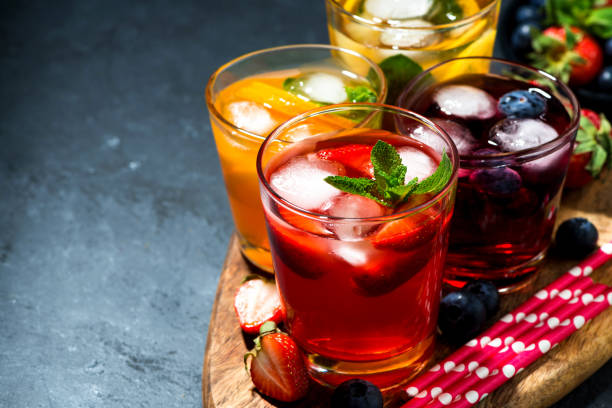 istock cold fruit and berry beverages in assortment on dark background 1133508039