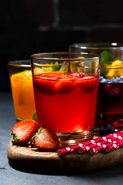 istock fruit and berry beverages in assortment, vertical 1133508636