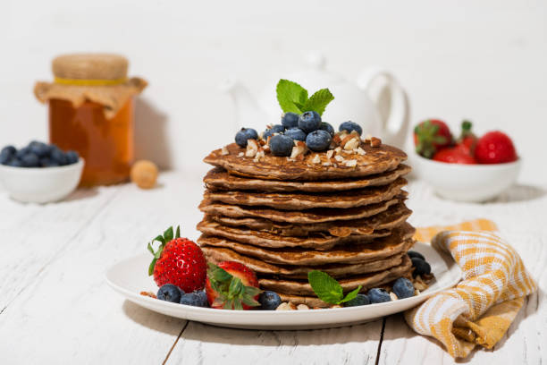 istock stack of homemade pancakes for breakfast on white table 1133508739