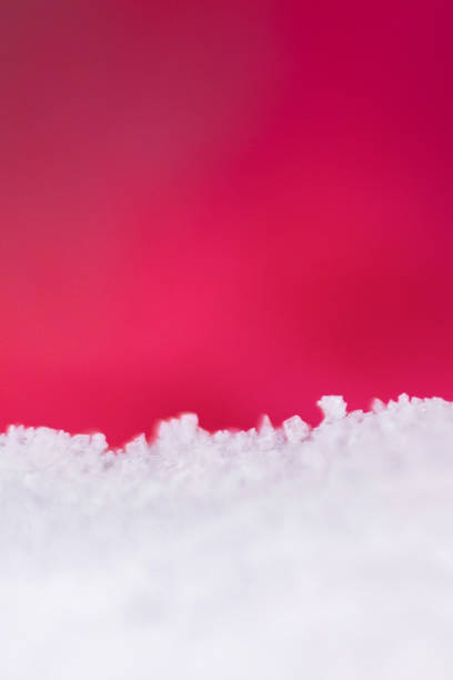 istock Blurry on ice crystals frozen in refrigerator on red background 1133510785