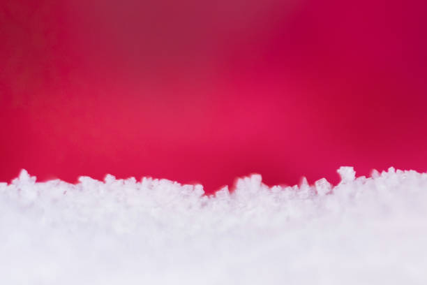 istock Blurry on ice crystals frozen in refrigerator on red background 1133510790