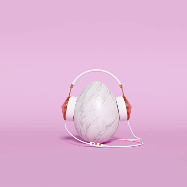istock Music listening Minimal concept. Egg shaped marble stone with headphones. 3d rendering 1133512027
