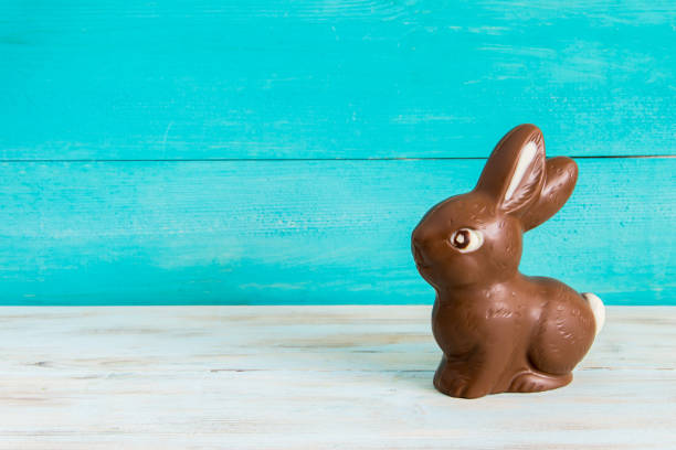 3D rendered chocolate bunnies with large copy space. With clipping path feature background can be replaced.