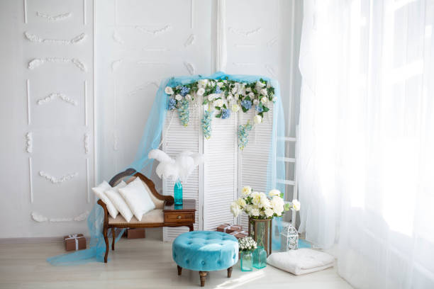 istock Spring decor with flowers in photo studio. 1133515469