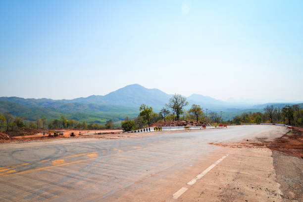 istock Road construction equipment and road Repair machine digging at the construction site 1133515719