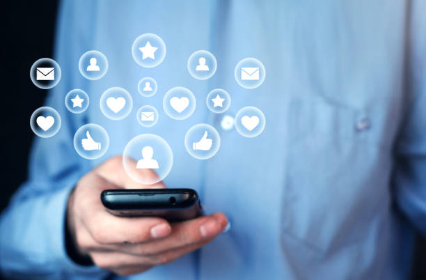 istock Man holding phone. Social Media Concept 1133516462