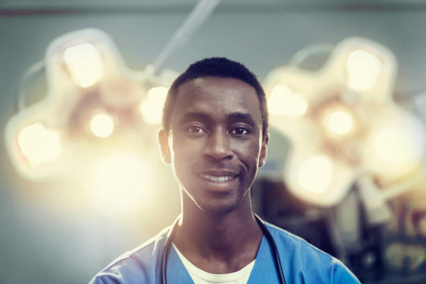 istock Portrait of surgeon in illuminated operating room 1133516732