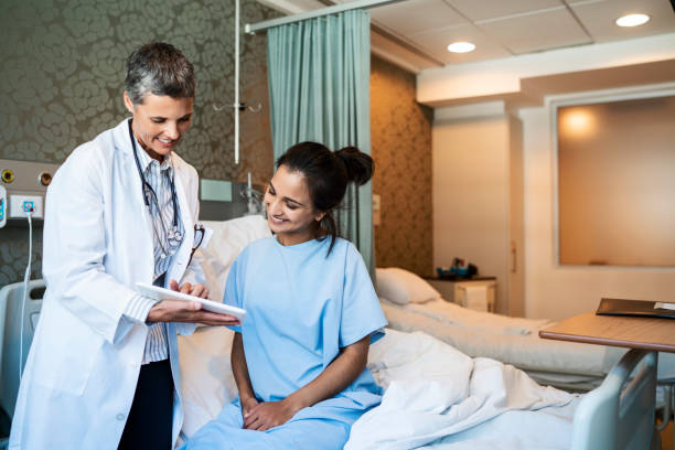 istock Healthcare worker explaining test results to woman 1133517852