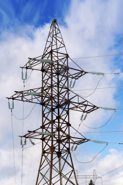 istock Pylons of high-voltage power lines and a blue sky with clouds 1133519165