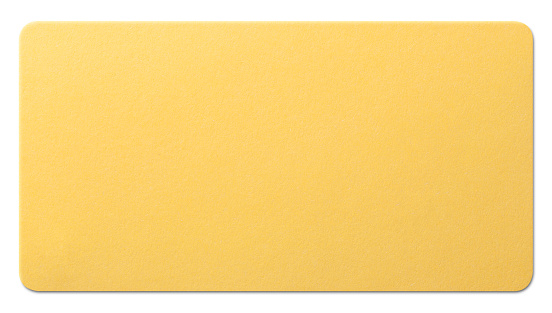 Yellow paper label on white background. Photo with clipping path.