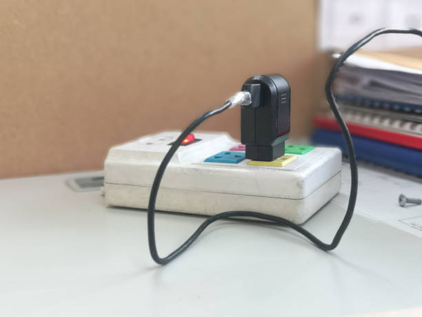 istock Electrical plugs are plugged into the outlet 1133521699
