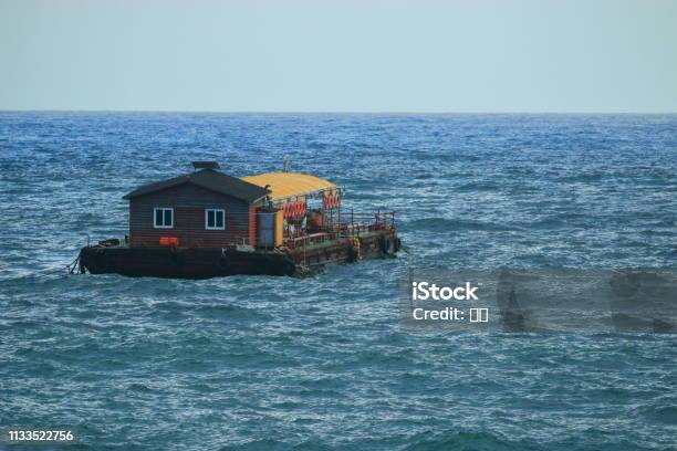A House On The Sea Stock Photo - Download Image Now - Bathtub, Beach, Cliff