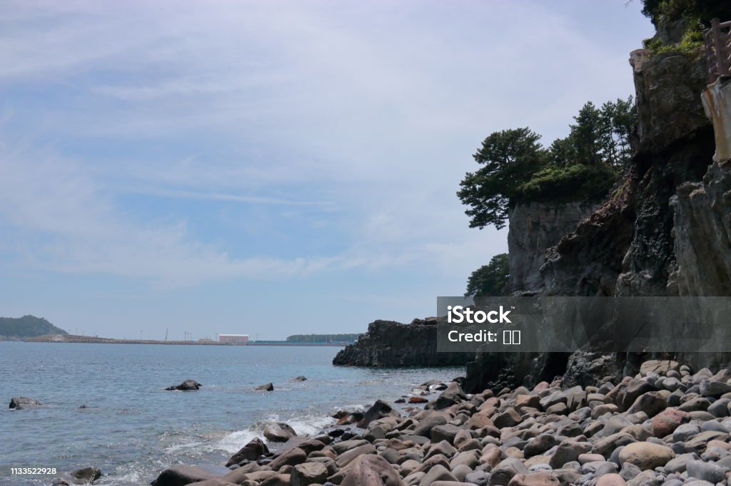 Sojeongbang waterfall, waterfall, coastal, cliff This is a view of the waterfall on the coast of Jeju. Bathtub Stock Photo
