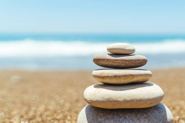 istock Stack of zen stones on the beach near sea 1133524982