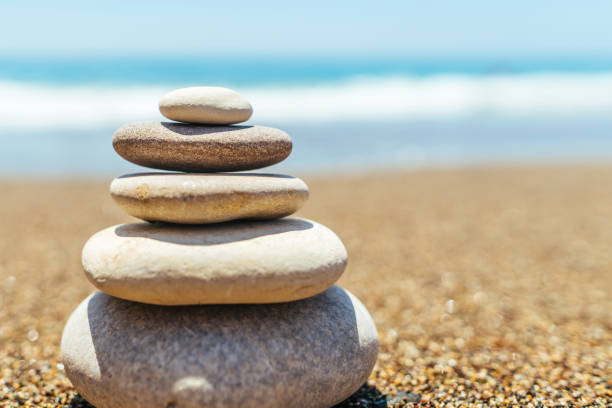 istock Stack of zen stones on the beach near sea 1133524988