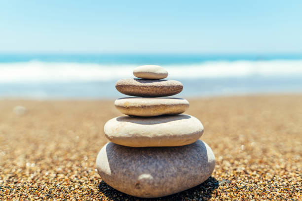 istock Stack of zen stones on the beach near sea 1133524998