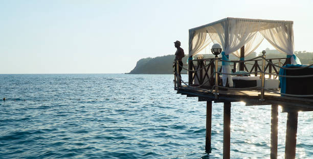 istock Five stars luxury hotel's pavilion by the sea panoramic view - getting away from it all 1133526123