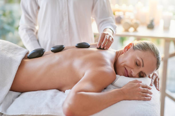 istock Promoting total rejuvenation with hot stones 1133526214