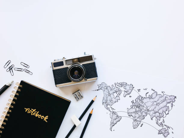 istock Business background with old, vintage camera and notebook 1133526610