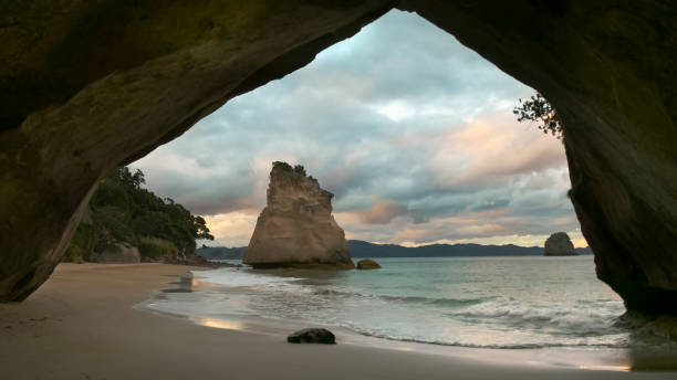 istock sunset at cathedral cove on the coromandel peninsula in nz 1133527904