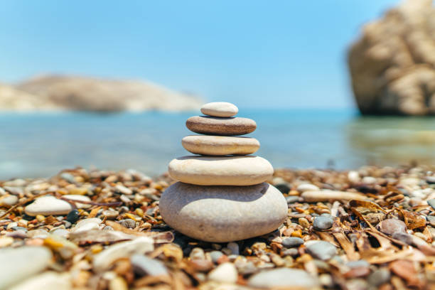 istock Stack of stones on the beach near sea 1133528923
