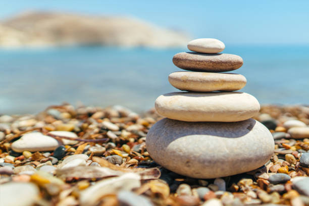 istock Stack of stones on the beach near sea 1133528926