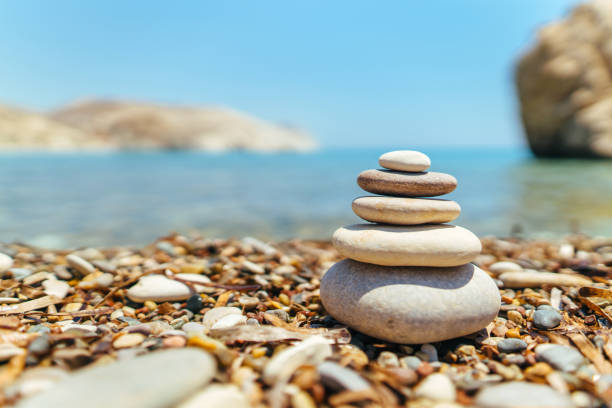 istock Stack of stones on the beach near sea 1133528946