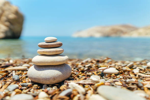 istock Stack of stones on the beach near sea 1133528951
