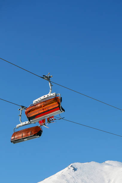 istock Mountains in winter with ski lift 1133528971