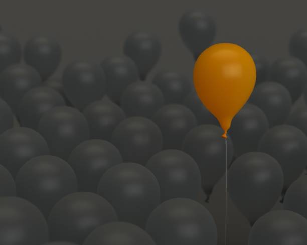 istock 3D rendering orange colored balloon Get out of the crowd 1133529047