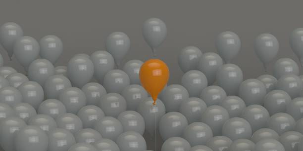 istock 3D rendering orange colored balloon Get out of the crowd 1133529062
