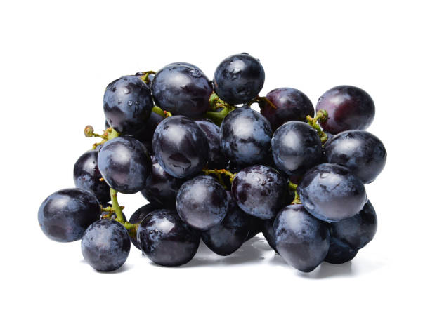 istock Fresh bunch of black grapes. White isolated background. Close-up. 1133533134