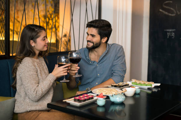 istock Young couple in a restaurant 1133534144
