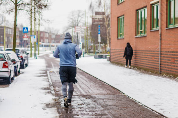 istock Bad weather fitness training for man 1133534972