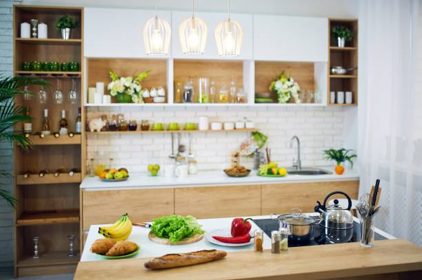 istock Vegetables and bread placed on wooden table. Kitchen without people. 1133534991
